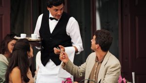 Hotel tips-waiter talking to people